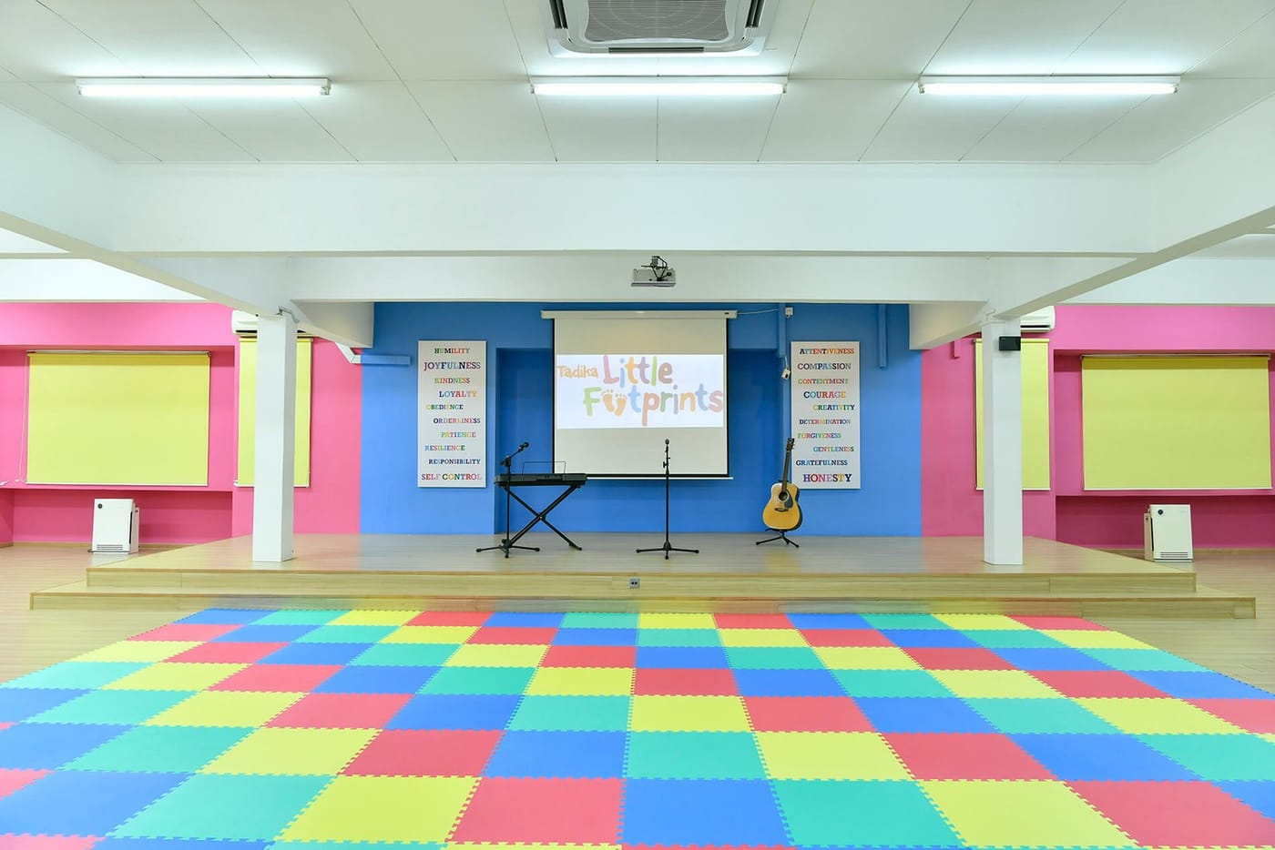 The assembly hall stage with keyboard and guitar